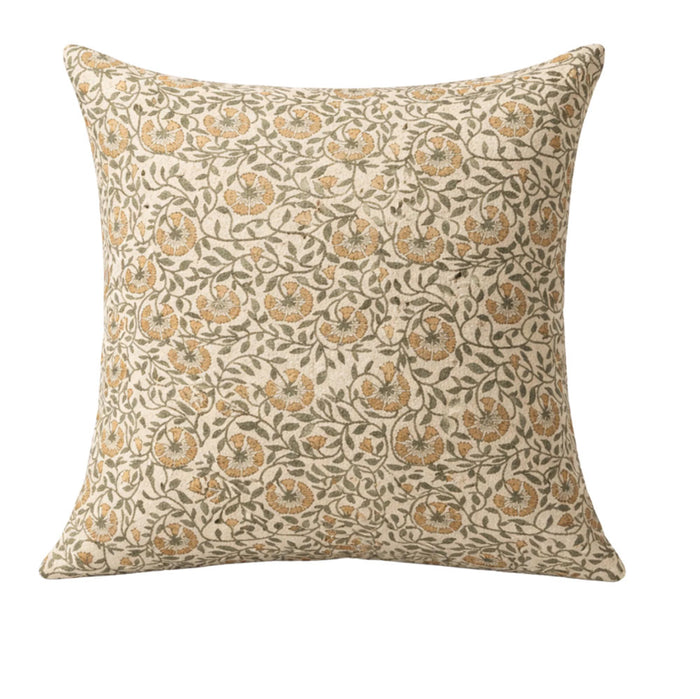 Decorative pillow with floral pattern on a beige background